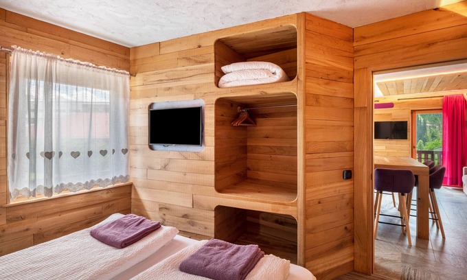 Pie Falcade Apartamento | Apartment 'Tana Del Picchio Rosso' with Mountain View, Shared Garden and Wi-Fi
