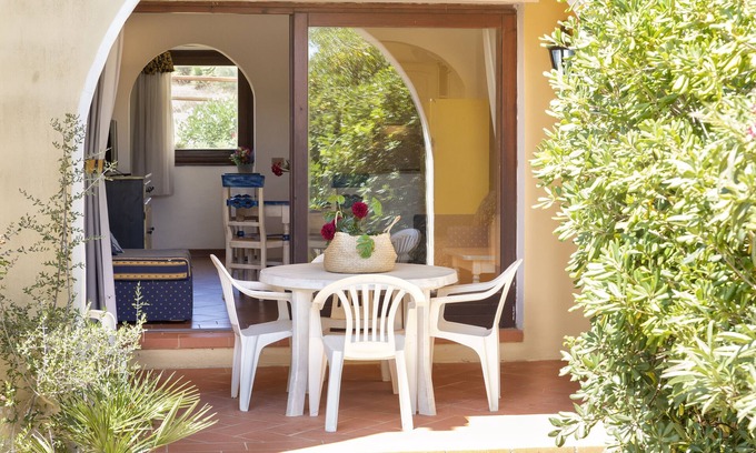 Punta De Su Turrione Apartamento | Apartamento 'Trilocale Fiordaliso' con vistas al mar, terraza y piscina compartida
