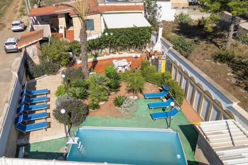 Scala di Furno Casa | Apartment Tritone in Luxury Villa with Shared Pool