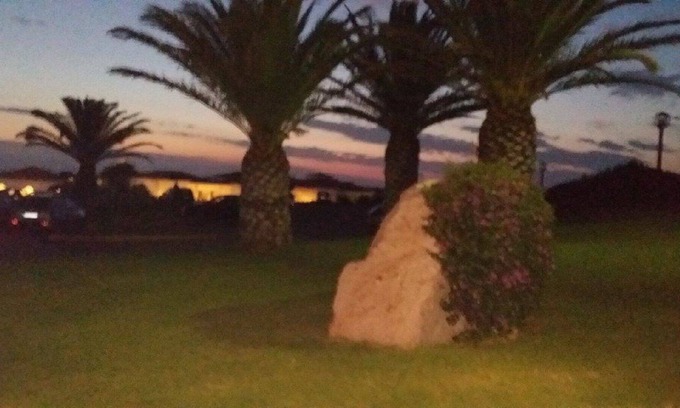 Capo Ferro Casa | Apartamento con vistas al mar a 30 metros de la playa de Cala del Faro