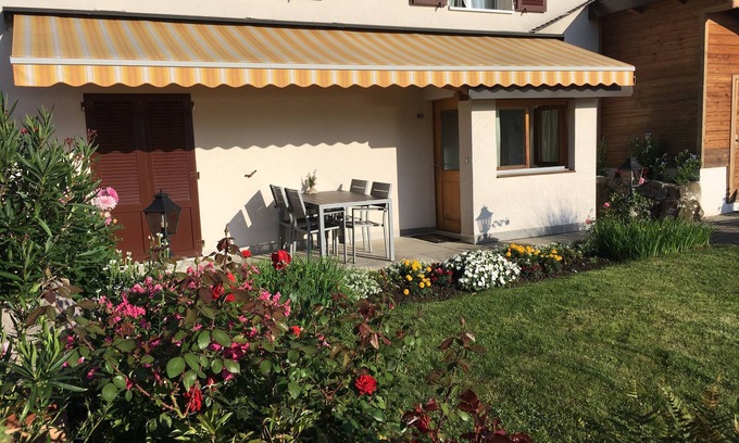 Faulensee Apartamento | Apartamento con terraza y vista al lago.