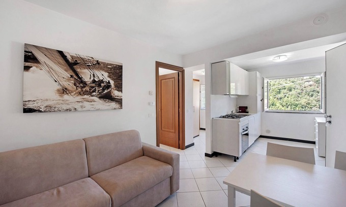 Celle Ligure Apartamento | Apartamento 'Zafferano Suites - Origano' con vistas al mar, jardín compartido y Wi-Fi