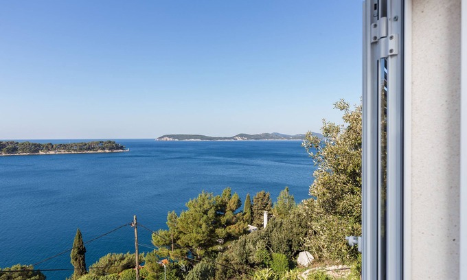 Lozica Apartamento | Apartments Lovro - Apartamento dúplex de un dormitorio con terraza y vistas parciales al mar (1)