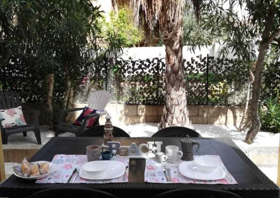 Olbia Casa | APPARTAMENTO CORALLO with PRIVATE GARDEN