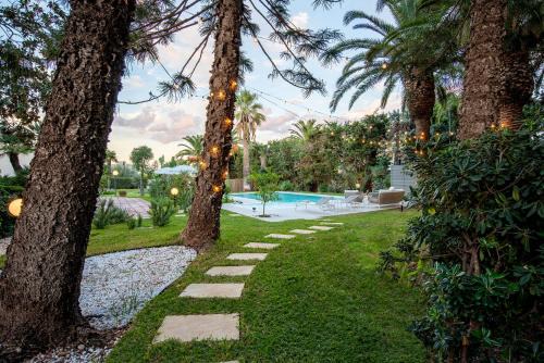 Grottasanta Apartamento | Appartamento in Villa con giardino - numeroquattro