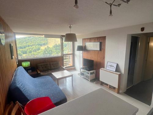Besse-et-Saint-Anastaise Apartamento | Appartement skis aux pieds, F2+Cabine au 20ème étage - FR-1-814-25