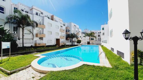 Achakkar Apartamento | Appartement avec piscines, vue sur mer et accès à la plage à Achakar Hill, Tanger.