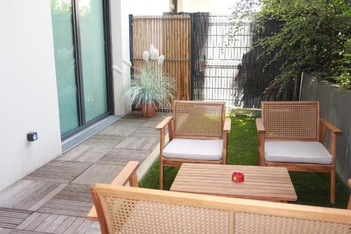 Quartier du Vieux-Pont - Sainte-Genevieve Apartamento | Appartement chaleureux à 10 minutes de la Défense