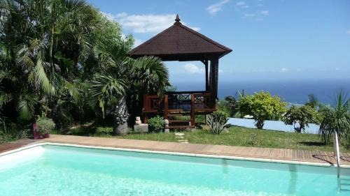Les Avirons Apartamento | Appartement convivial avec vue sur la mer