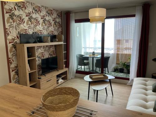 Centre Ville Apartamento | Appartement cosy avec garage