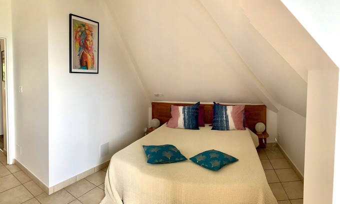 Piton Saint-Leu Apartamento | Appartement le Guétali, T3 de 60m² à l'étage, 2 chambres. Vue jardin et mer