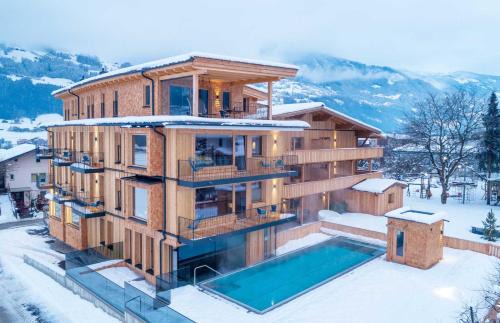 Ried im Zillertal Apartamento | Appartement Zillertal Klee mit Restaurant KleemenTine