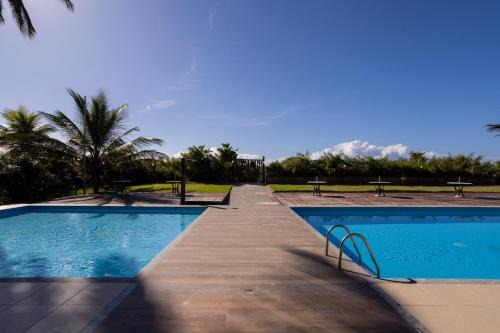 Aritagua Apartamento | Apt em Condomínio pé na areia - Praia da Perola