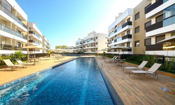 Cachoeira do Bom Jesus Apartamento | Apto 100m da Praia Com Piscina Aquecida e Lazer