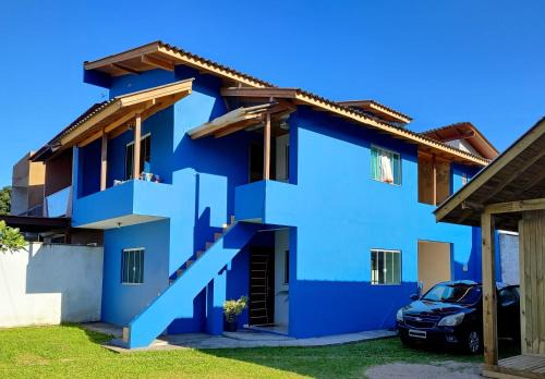 Muquem Casa | Apto com jeito de casa entre o mar e a montanha