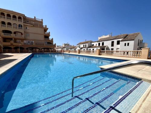 Almerimar Apartamento | Apto luminoso con vistas al golf y playa, con parking, piscina