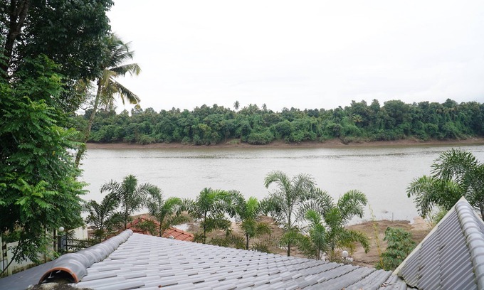 Perumbavoor Villa | aqua water front resort una villa con vista al río periyar
