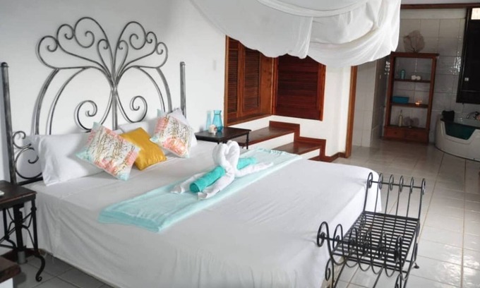 Soto Cama Y Desayuno | Habitación Aquamarine @ Oceanview B&B Curacao