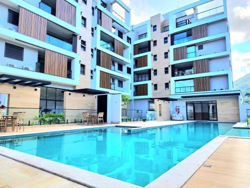 Praia da Enseada Apartamento | Aruna