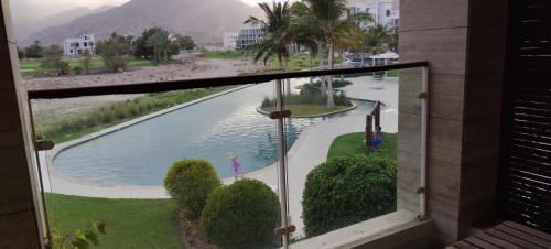 As Sifah Apartamento | As sifah studio with sea & pool view
