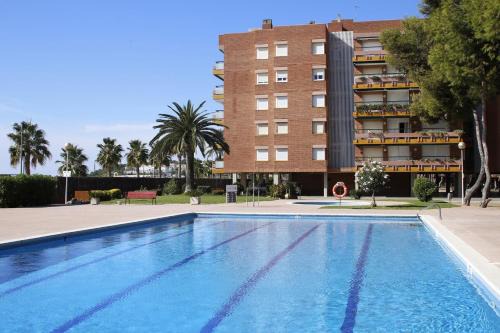 Torredembarra Apartamento | AT080 Pins, comunidad con piscina en 1ra línea de la playa