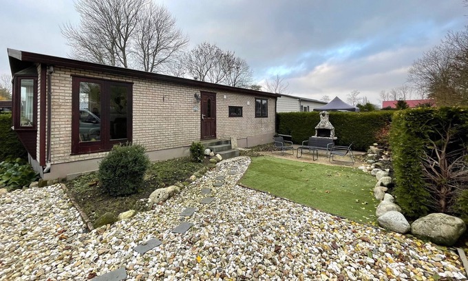 Tzummarum Chalet De Esquí | Chalet atmosférico con hermoso jardín, en un parque de vacaciones cerca del mar de Wadden