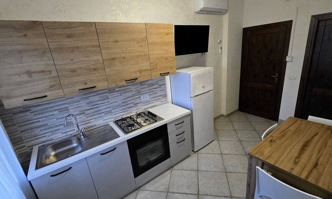 Biancareddu Apartamento | Attic family apartment surrounded by nature, 2 minutes from the sea.