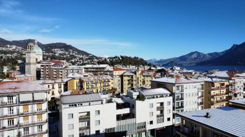 Intra Apartamento | Attico Don Minzoni