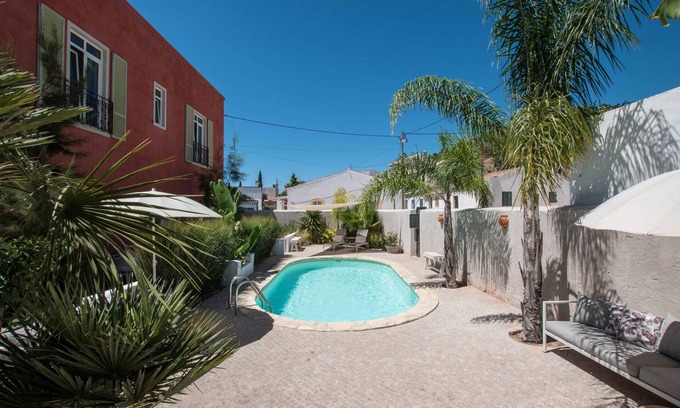 Santa Catarina da Fonte do Bispo Villa | Attractive Villa for Families / Groups with nice Garden and Pool