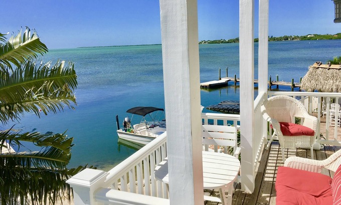 Cudjoe Key Casa | Lujosa casa frente al mar en la playa, muelle, kayaks, bicicletas, pozo de fuego