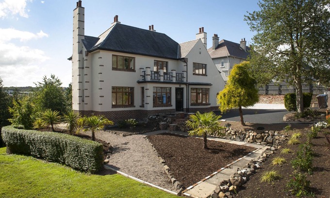 Coleraine Casa | Award winning villa with River Views, Private Forest entrance and a Hot Tub.