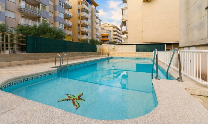 Daimuz Casa | AZUL - Coqueto apartamento con piscina compartida y Wifi gratis