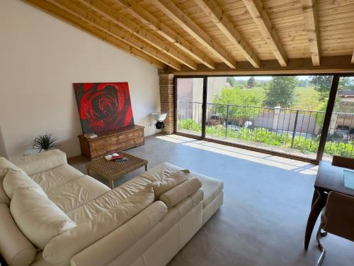 Bornato Casa | B&Bike la vetrata sui vigneti