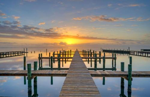 Flour Bluff Casa | Balcony w Bay View Shared Pool Boat Dock Fat Flounder by AvantStay