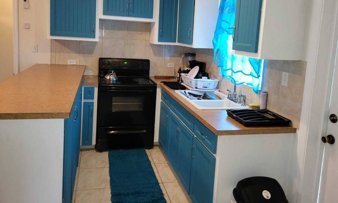Great Exuma Casa | Balmain Vista is a 2 bedroom , 2 bathroom living room space and 1 kitchen area.