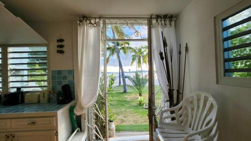 Nettle Bay Apartamento | Bamboo on the beach - Spacious beachfront studio