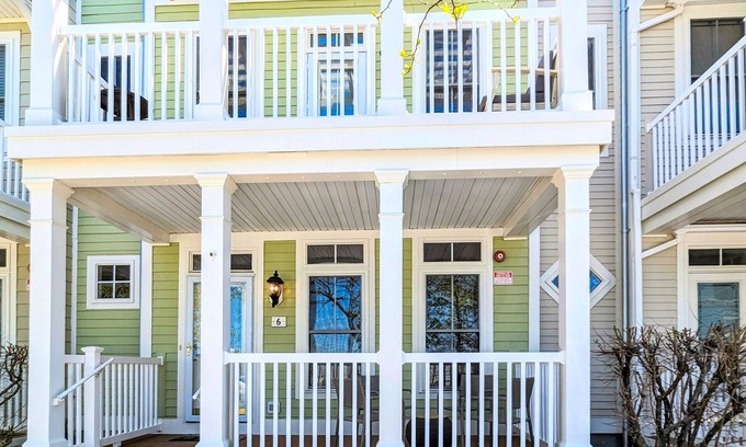 Sunset Island Casa | Bay view townhome with multiple decks, pool & gym - walk to the beach