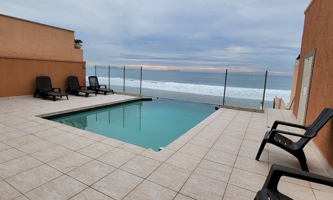 Playas de Tijuana Condominio | Beach Front with Pool, Piano, Pool Table, Bar and Beach Access
