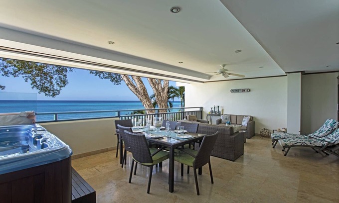 Old Trees Bay Apartamento | Apartamento frente al mar en Coral Cove en Paynes Bay Beach