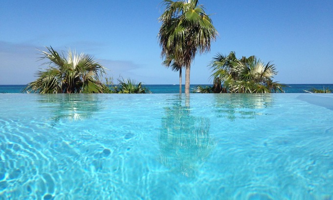 North Palmetto Point Casa | PISCINA INFINTY FRENTE AL MAR, 4HAB / NUEVO! 4 BAÑOS