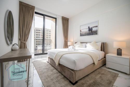 Al Hamra Village Apartamento | Beachfront Luxury 1BR Sea View