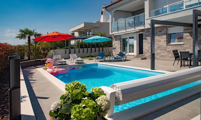 Kostrena Apartamento | Beachfront Luxury Apartment , salty water heated pool