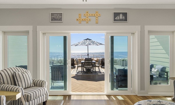 Port St. Joe Casa | Adosado frente a la playa al lado del muelle. ¡La playa es tu patio trasero! 3br / 2. 5 baños