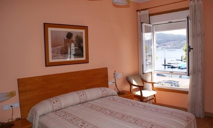 Moana Casa | Villa frente al mar con jardín y patio privados y parking gratis en la calle.