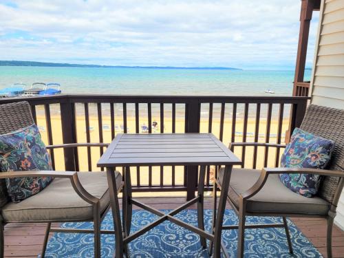 Traverse City Casa | Beachside 213 with Pool Hot Tub and Private Deck overlooking East Bay