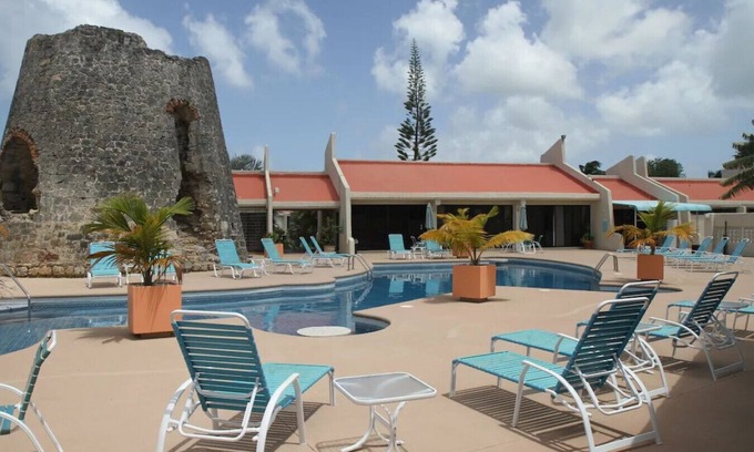 Estate Golden Rock Condominio | Beachside Serenity with Views