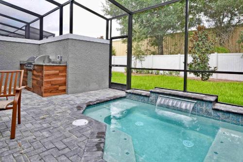 Kissimmee Casa | Beautiful 4BD home Themed Pool and Grill 4417