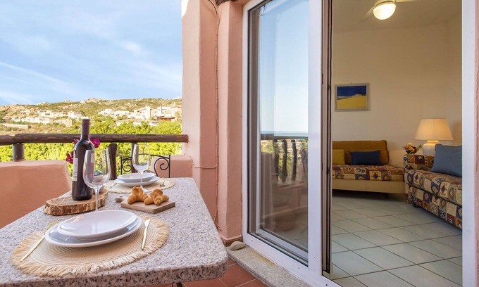 Canneddi Apartamento | Hermoso apartamento para 4 personas con WIFI, A/C, piscina, TV, terraza y mascotas permitida