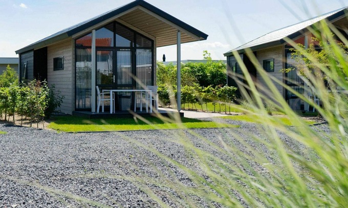 Municipality of Nunspeet Casa | Precioso apartamento en villa para 4 personas con piscina, WIFI, TV, terraza y aparcamiento