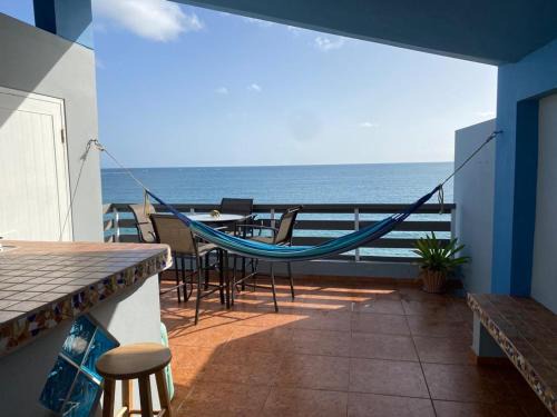 Playa Fortuna Apartamento | Beautiful Beach Front Penthouse w Rooftop Terrace